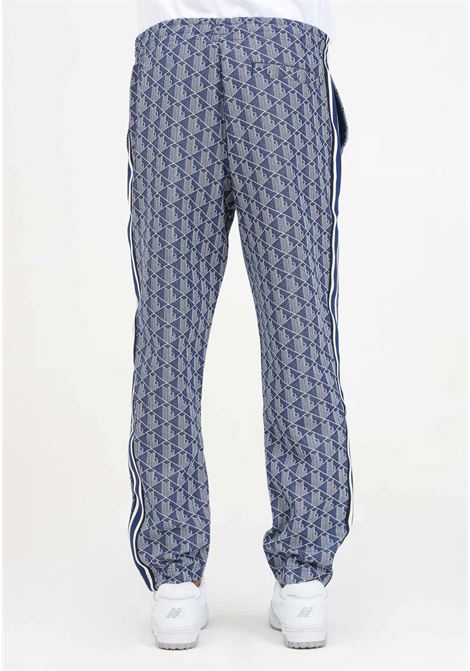 Pantalone sportivo blu da uomo con monogramma jacquard Paris LACOSTE | XH1440QIE