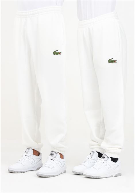 Pantalone sportivo bianco per uomo e donna con patch logo LACOSTE | XH275070V