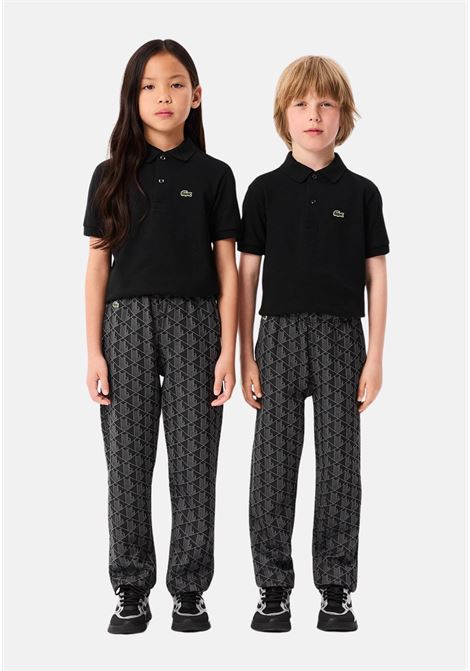 Pantalone sportivo nero per bambino e bambina con monogramma LACOSTE | XJ1232-J4PC