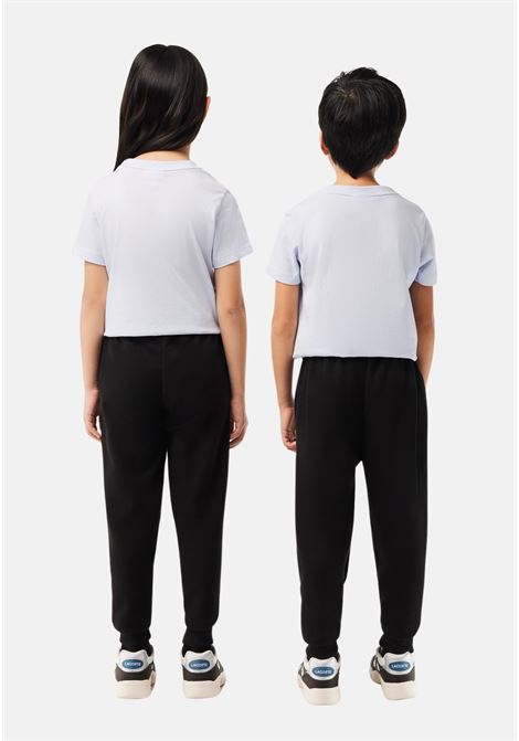 Pantalone sportivo nero per bambino e bambina rifinito da ricamo coccodrillo LACOSTE | XJ9728-J031
