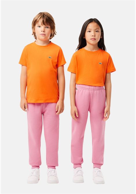 Pantalone sportivo rosa per bambino e bambina rifinito da ricamo coccodrillo LACOSTE | XJ9728-J2R3