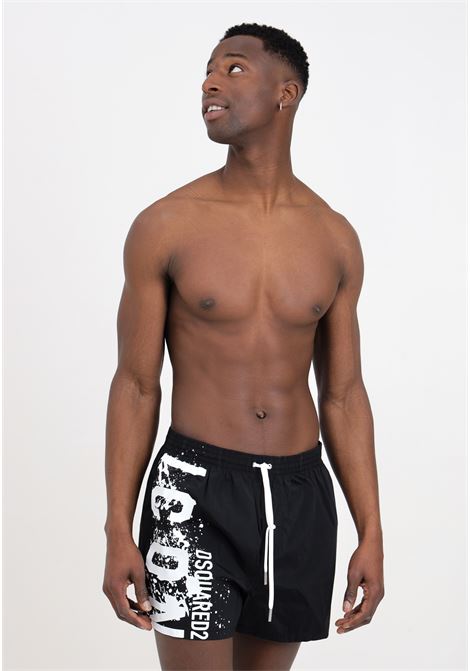 Black men's swim shorts with white paint splash logo print DSQUARED2 | D7B645420010