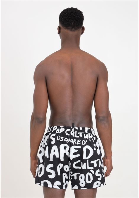Black men's swim shorts with white allover lettering logo DSQUARED2 | D7B645580010