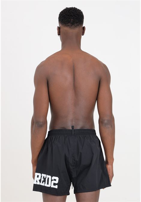 Shorts mare neri da uomo con stampa logo laterale in bianco DSQUARED2 | D7B8P5440010
