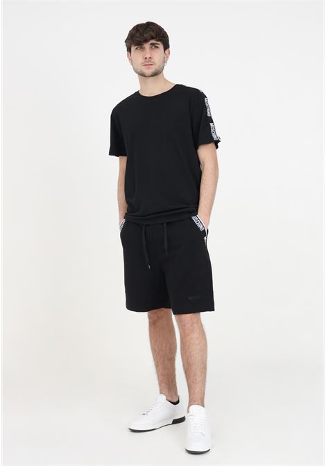 Black men's shorts with drawstring and logo at the bottom MOSCHINO | A681844220555
