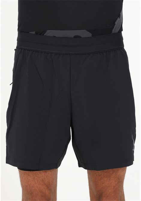 Black sports shorts for men with swoosh and side vents NIKE | DC5320010