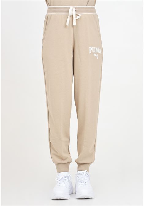 Pantaloni sportivi da donna Puma SQUAD Pants TR beige PUMA | 67790183