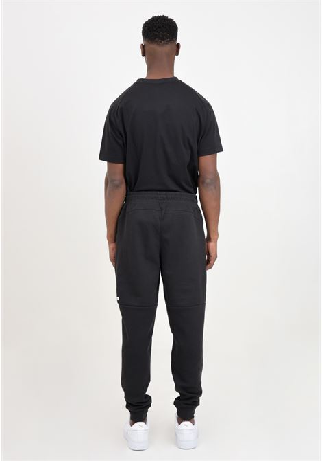 Black men's RAD/CAL sweatpants PUMA | 67891701