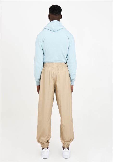 Beige men's trousers with logo print PUMA | 68045083