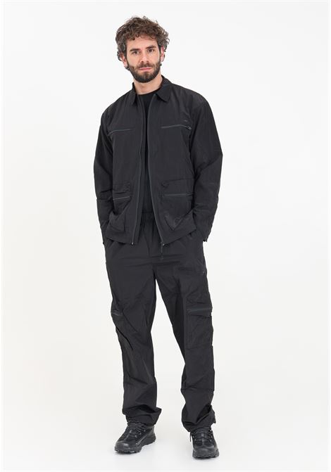 Black men's trousers with drawstring hem and waist RAINS | RA19200BLA